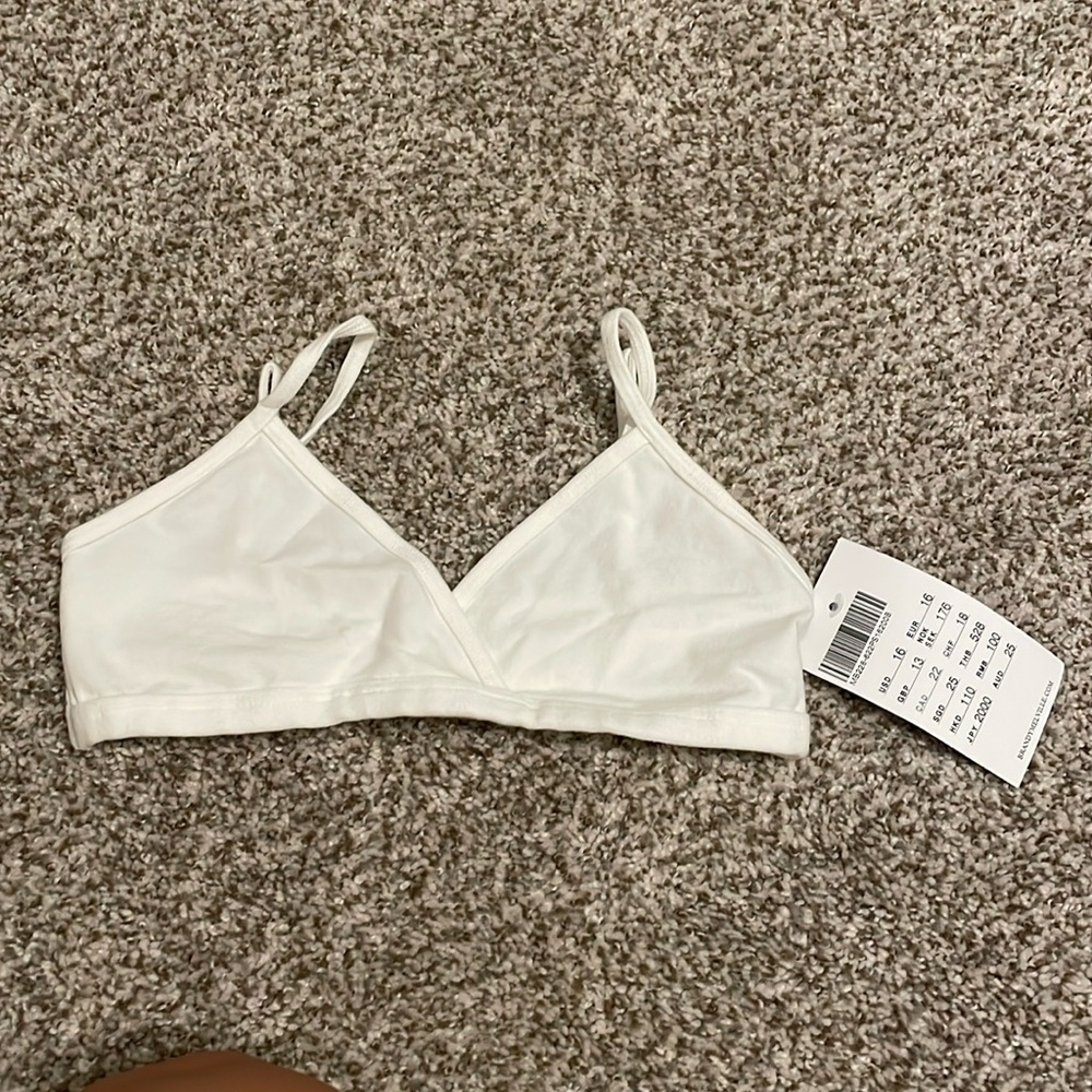 Brandy Melville white unpadded bralette. NWT